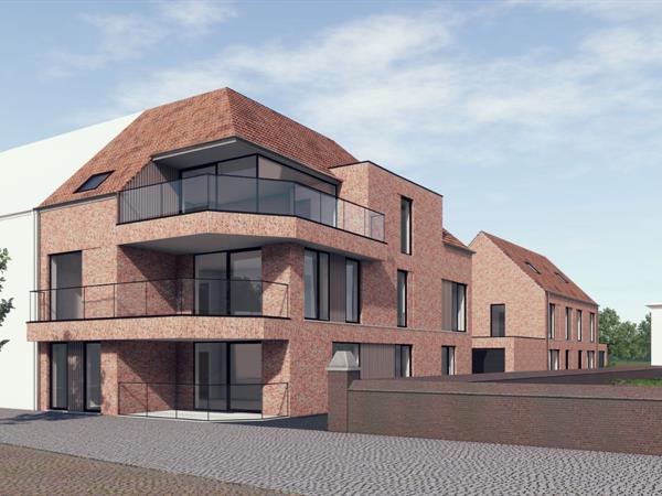 Gelijkvloers drieslaapkamerappartement met zongericht terras