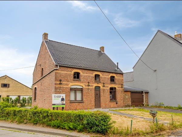 Charmant renovatieproject met inpandige garage en tal van mogelijkheden