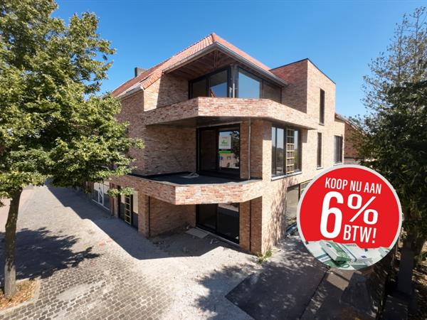 Gelijkvloers drieslaapkamerappartement met zongericht terras