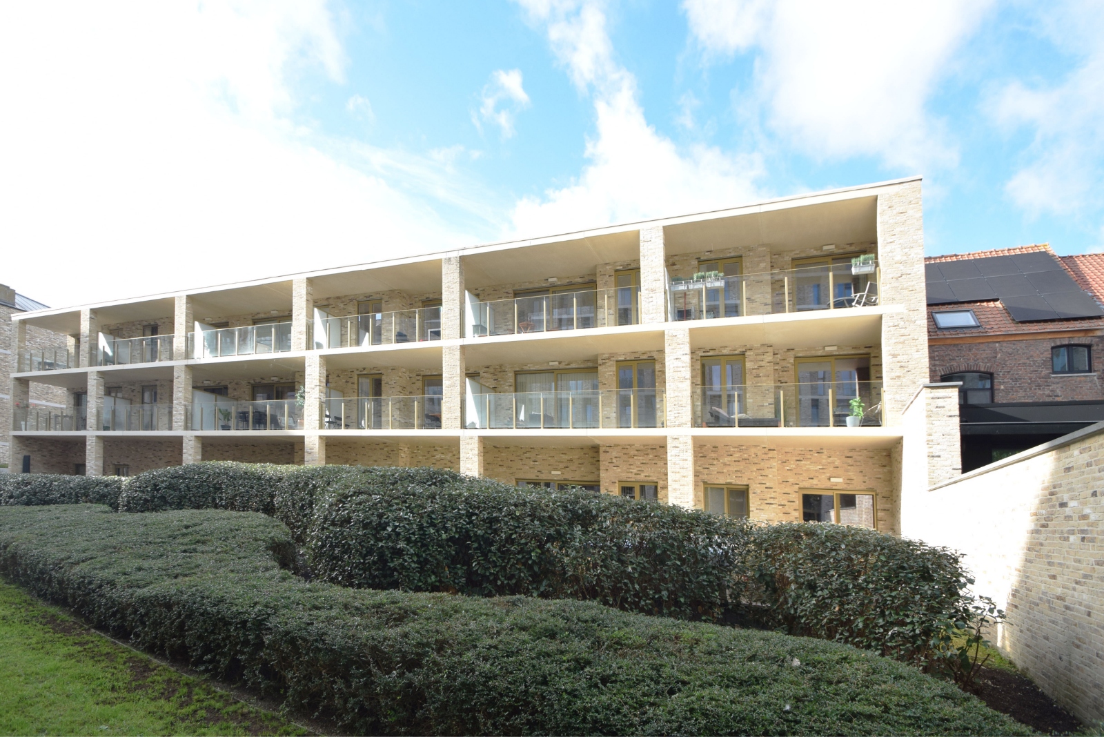 Modern appartement met 2 slaapkamers en ruim zuidgericht terras in hartje Ieper